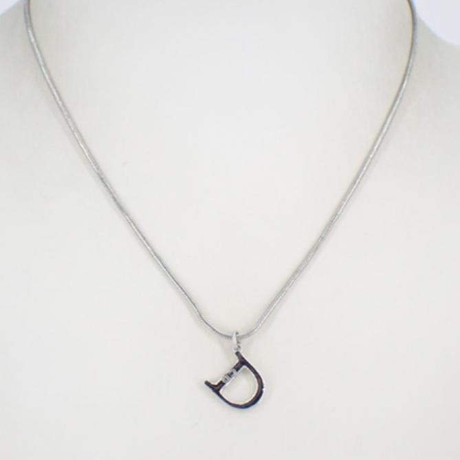 christian dior silver tone logo necklace