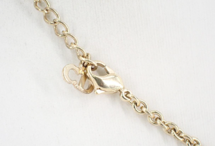 christian dior gold tone logo necklace