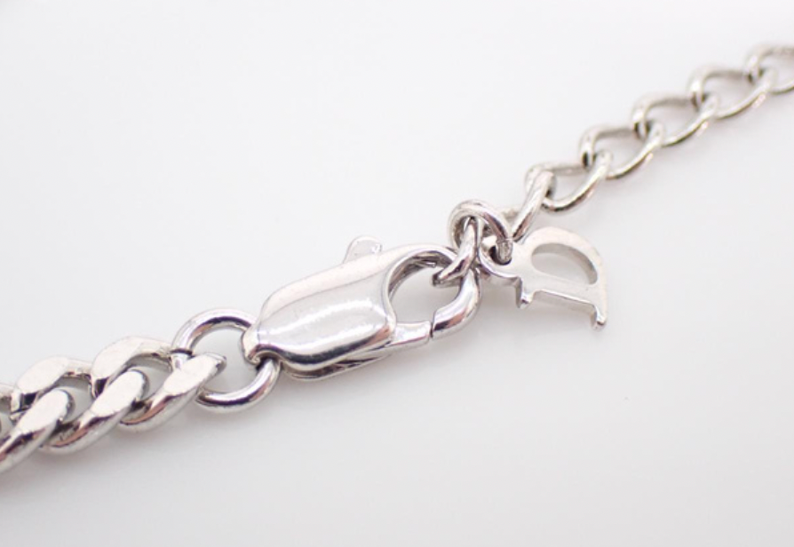 christian dior silver plate logo embellished bracelet