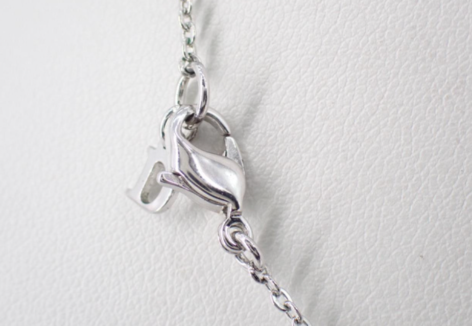 christian dior stone feather necklace