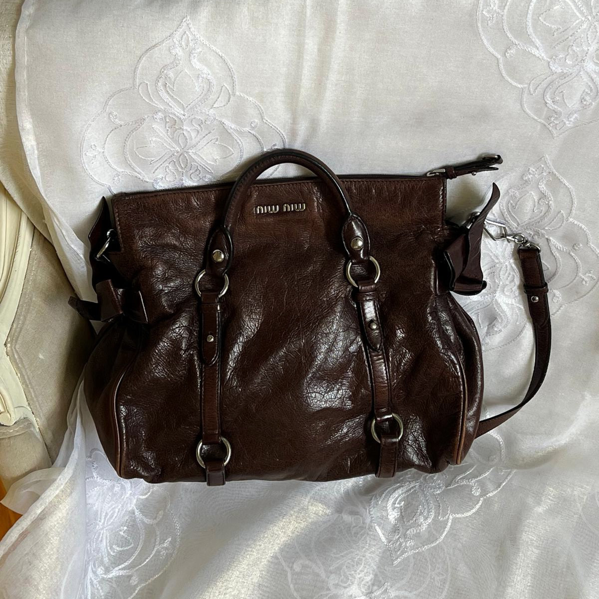 miu miu dark chocolate vitello vintage bow bag