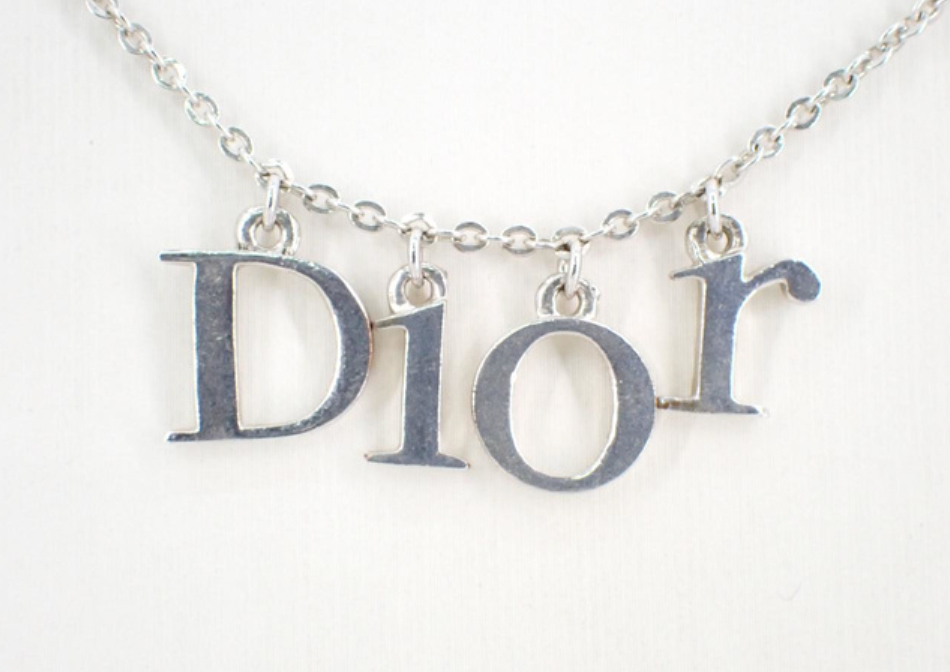 christian dior silver tone logo necklace