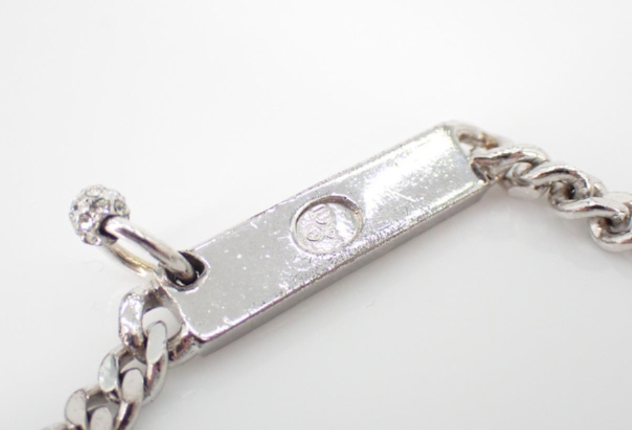 christian dior silver plate logo embellished bracelet
