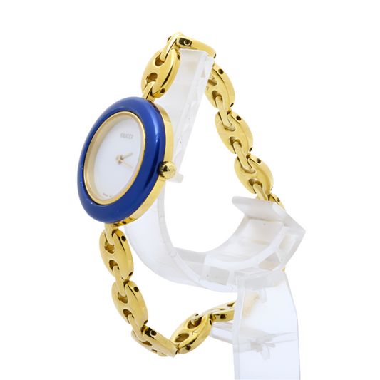 gucci elegant gold watch with blue bezel detail