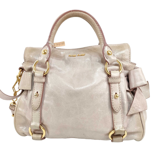miu miu pale pink mini vitello bow bag